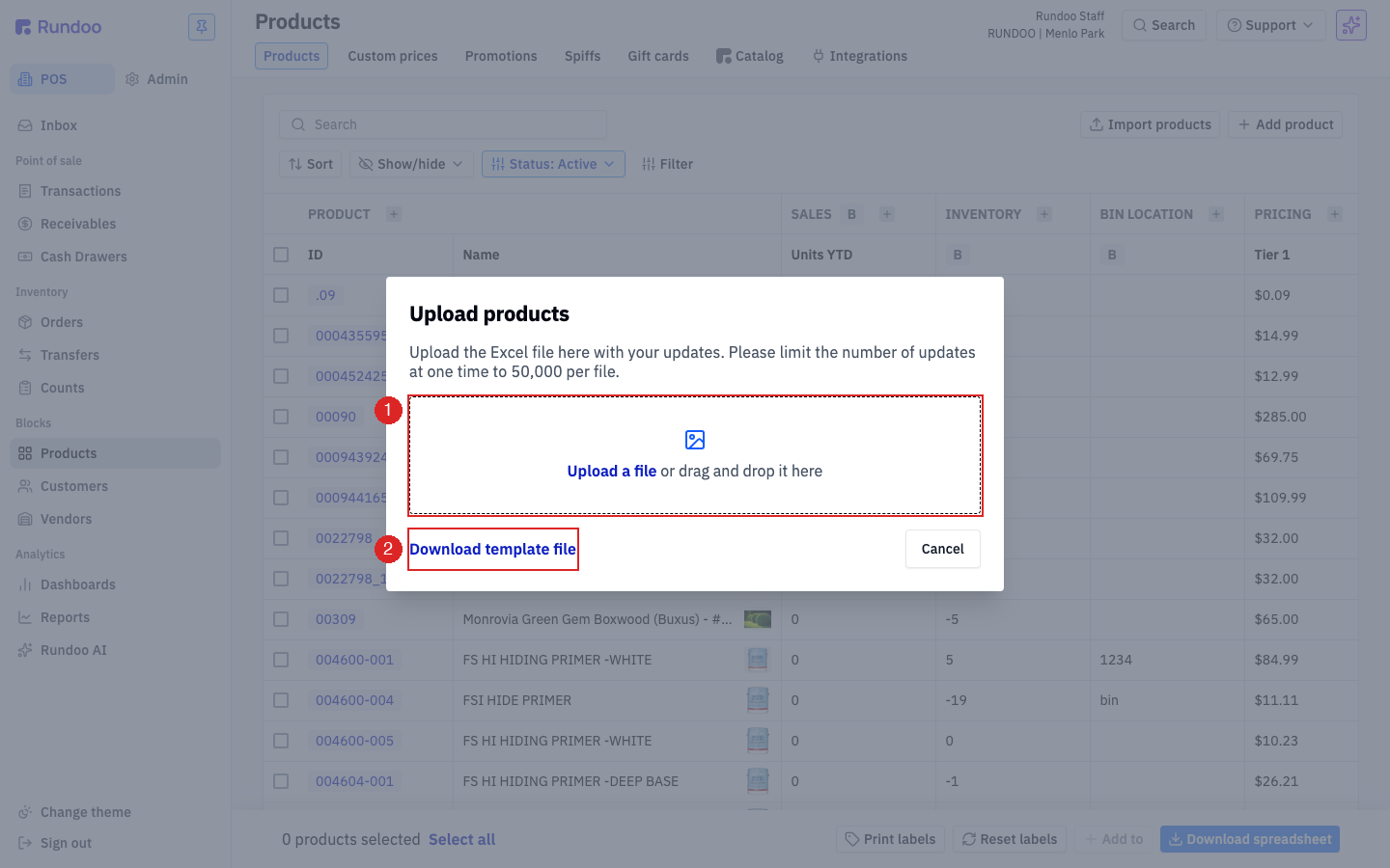 The Upload products window with a dashed drop-zone that reads Upload a file or drag and drop it here, and a Download template file link below it