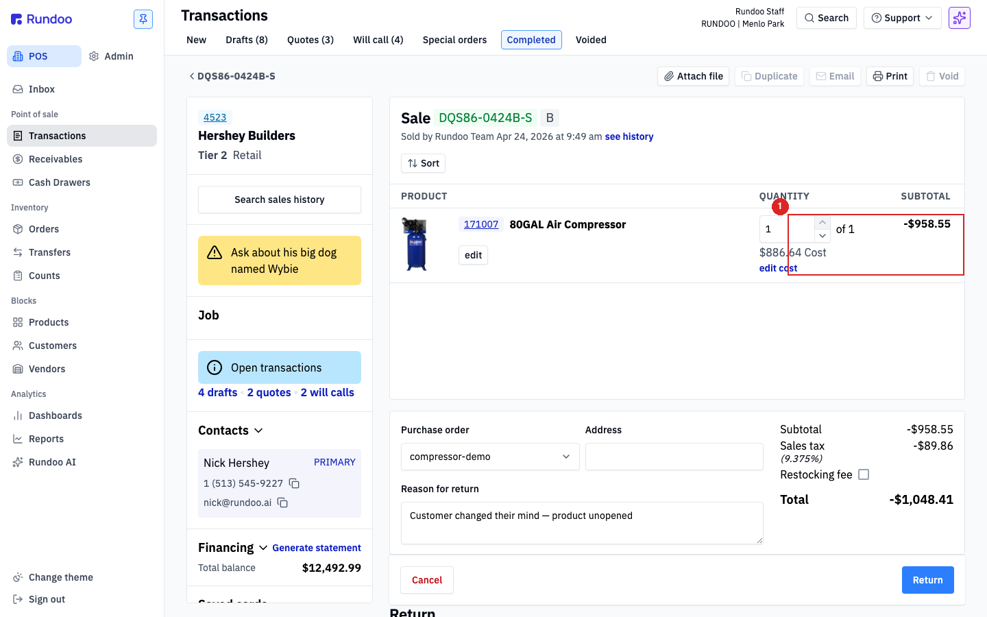 The return builder with the quantity stepper set, the Reason for return filled in, the Restocking fee checkbox, and the totals showing negative